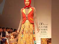 Child walking the ramp at Lakme Fashion Week Child walking the ramp at Lakme Fashion Week