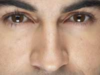 Man with big pupils