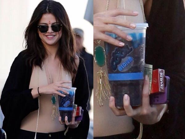 Selena Gomez Pictured With Cigarettes Selena Gomez Pictured With Cigarettes