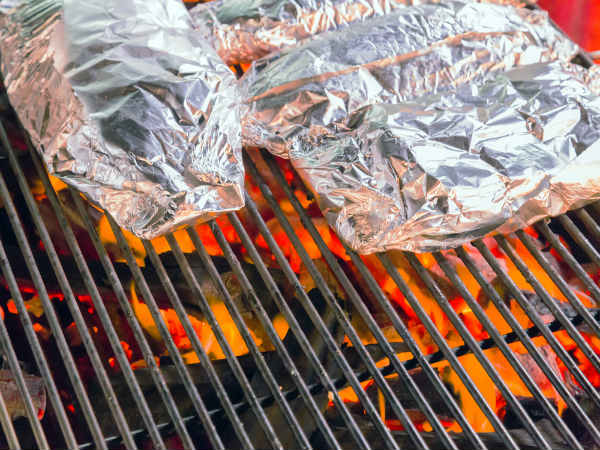 Is It Safe To Use Aluminium Foil While Cooking? - Boldsky.com