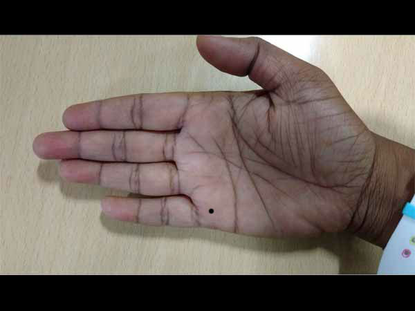 Moles on palm astrology