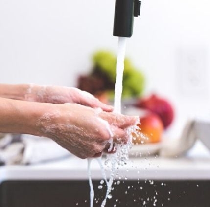 Wash your hands immediately after using the bathroom, before and after you care for a sick person, before and after preparing food, immediately after handling foods such as raw meat, poultry or fish and after your hands are greasy or dirty.
